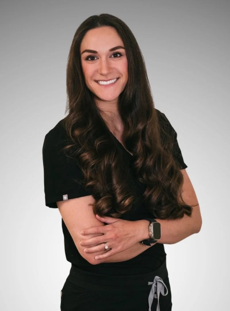 Dr. Paige Hoyer Williams, smiling, wearing black