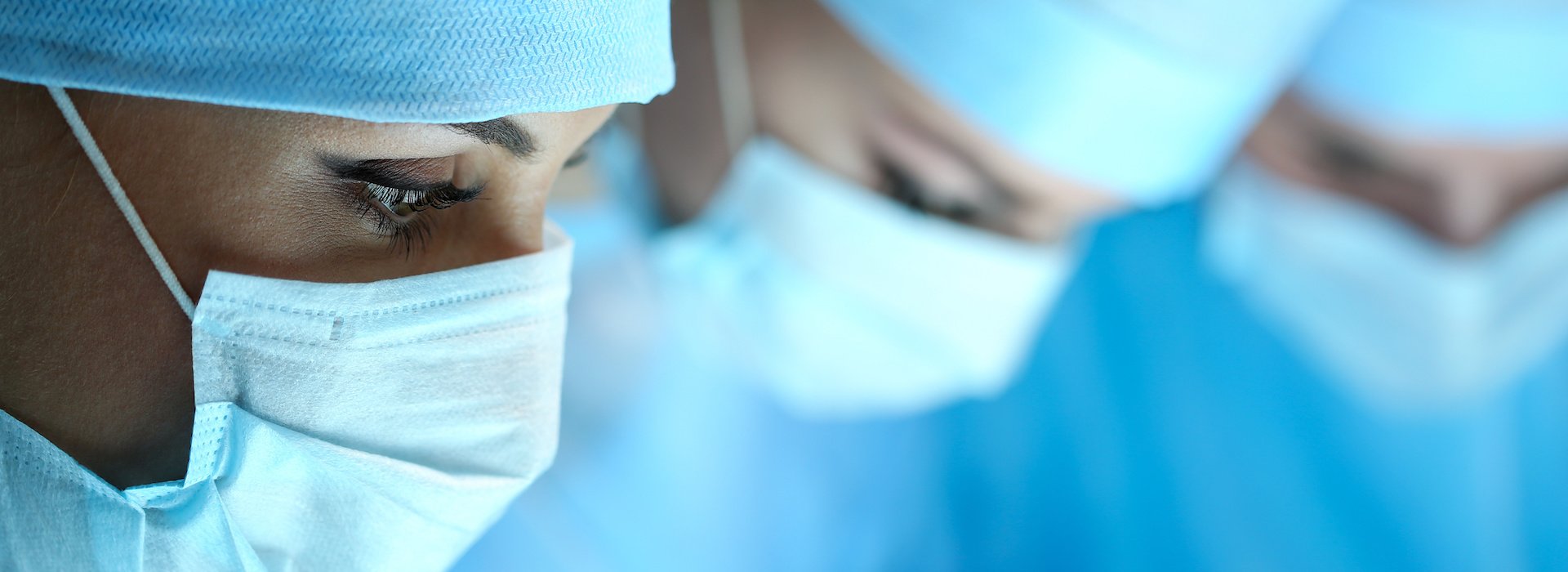 Surgeons wearing masks