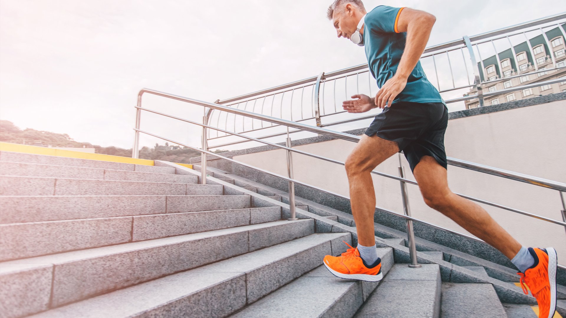 Runner climbing stairs