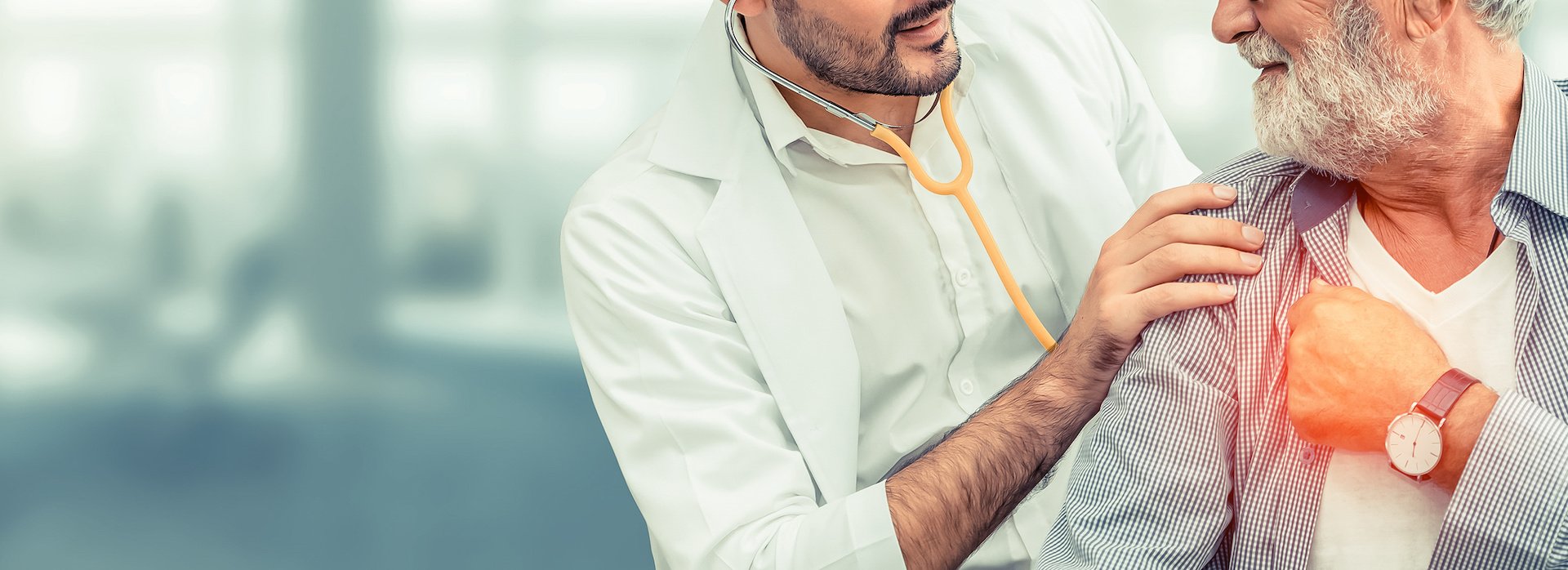 Pulmonologist listening to a patient's chest