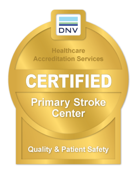 Gold badge indicating healthcare accreditation from DNV, certified Primary Stroke Center focused on quality and patient safety.