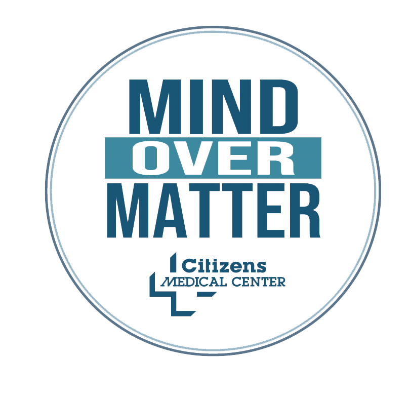 Medical center logo with the slogan "Mind Over Matter" and a cross symbol.